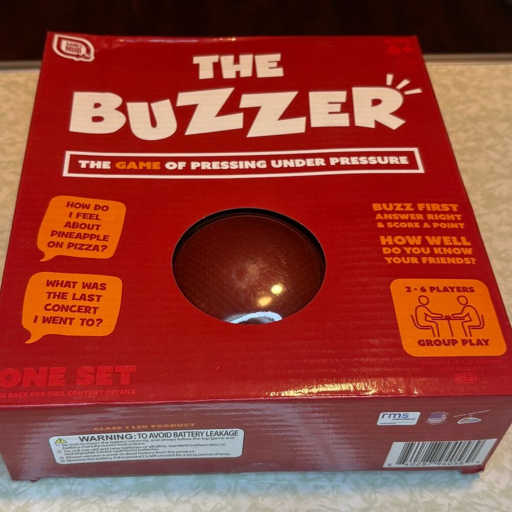 The Buzzer: The Game of Pressing Under Pressure Party Game by Cardinal